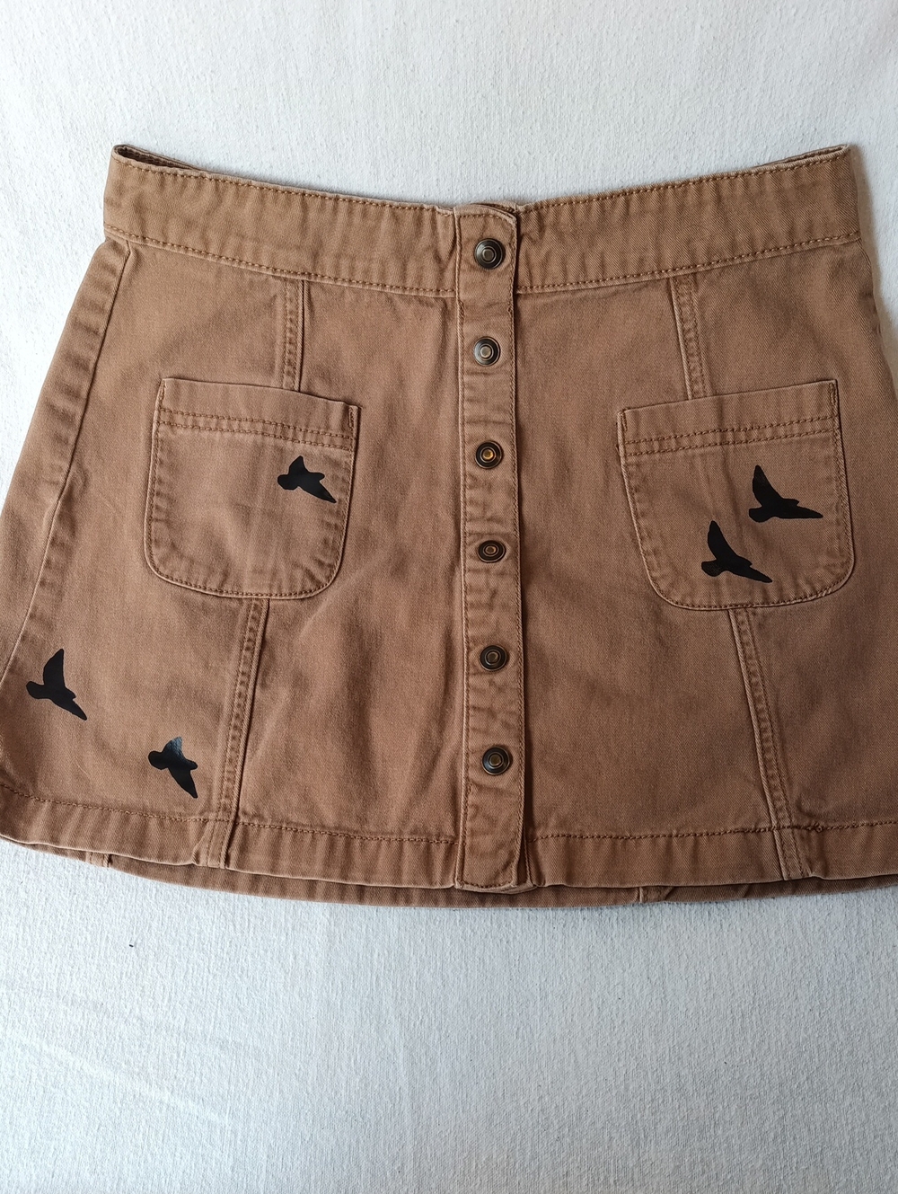 Forever 21 Tan Button-Front Mini Skirt with Black Bird Accents